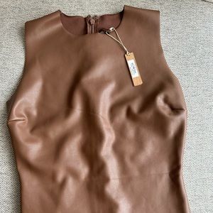 Skims Faux leather bodysuit (thong) in light brown.